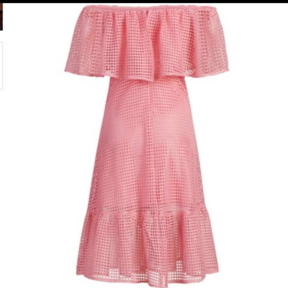 We have a cute summer dress. The color is morgan pink its a size xs